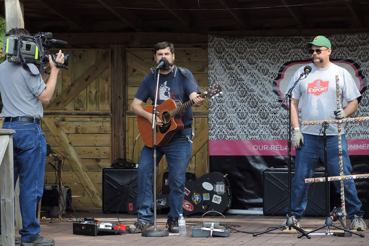 Glenn performing on stage